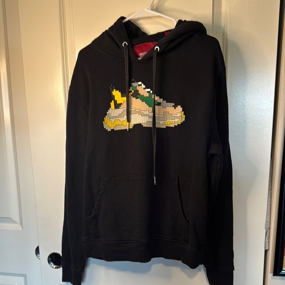 Mostly Heard Rarely Seen Black and Yellow Cartoon Graphic Sweater - Picture 4 of 14